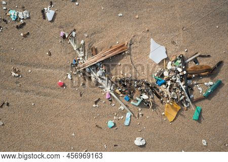 Plastic Waste And Micro Plastic Washed On The Shore Of The Atlantic Ocean