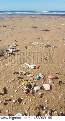 Plastic Waste And Micro Plastic Washed On The Shore Of The Atlantic Ocean