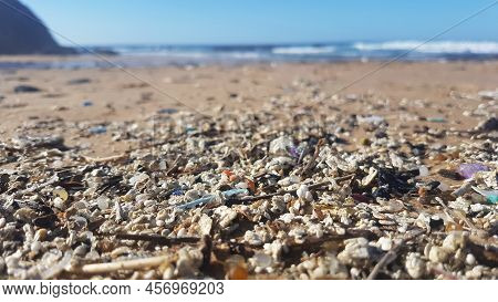 Plastic Waste And Micro Plastic Washed On The Shore Of The Atlantic Ocean