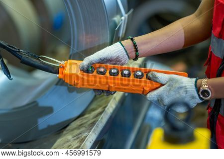 Hand Using Remote Control Overhead Cranes Remote. Foreman Or Worker Using Remote Control Machine At 