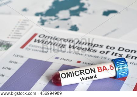 Blood Tube For Test Detection Of Virus Covid-19 Omicron Ba.5 Variant On Papers Document. Concept For