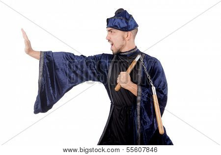 Martial arts master with nunchucks on white