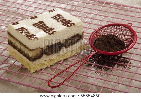 Tiramisu And Sieve With Cocoa