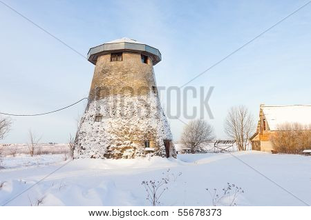 Truncated Windmill, A House And Snow