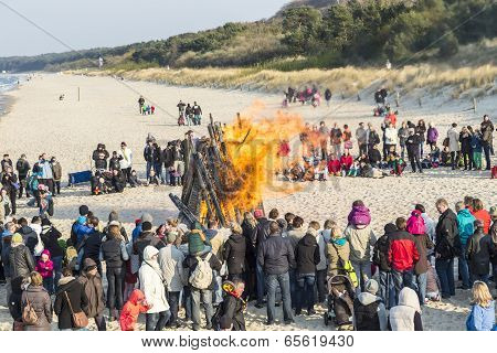 People Watch The Easter Fire At The Beach