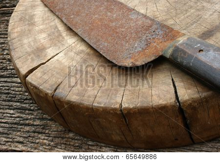 Wood Cutting Board And Rusty Knife
