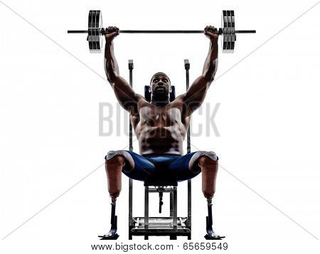 one muscular ped man body builders building weights with legs prosthesis in silhouette on white background
