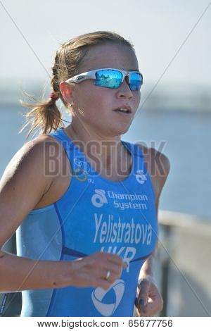 DNEPROPETROVSK, UKRAINE - MAY 24, 2014: Yuliya Yelistratova of Ukraine leading in the ETU Sprint Triathlon European cup. It's the first time Triathlon European Cup take place in Ukraine