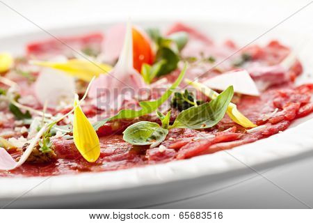 Beef Carpaccio with Parmesan Cheese, Herbs and Cherry Tomato