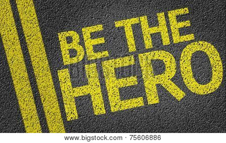 Be the Hero written on the road