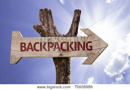 Backpacking wooden sign on a beautiful day