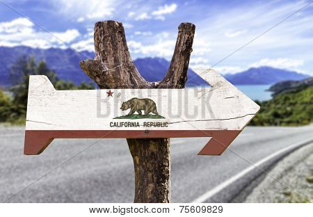 California State wooden sign with a paradise on background 