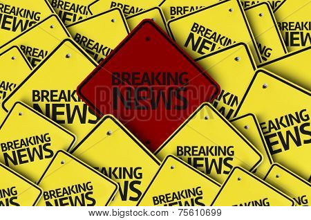 Breaking News written on multiple road sign 