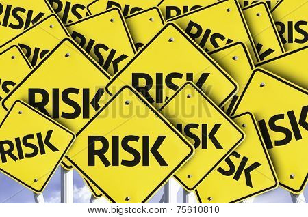 Risk written on multiple road sign 