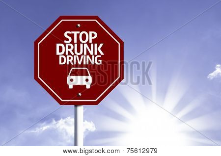 Stop Drunk Driving red sign with sun background 