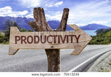 Productivity wooden sign with a street background 