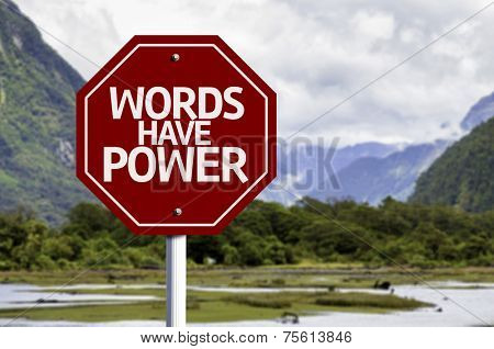 Words Have Power red sign with a landscape background