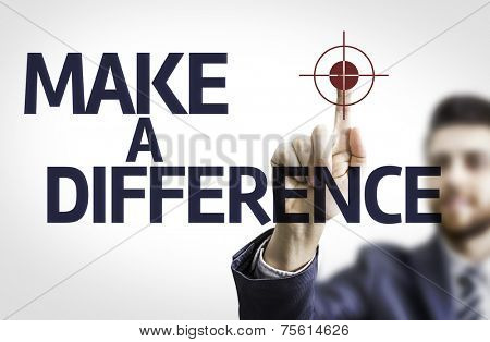 Business man pointing to transparent board with text: Make a Difference