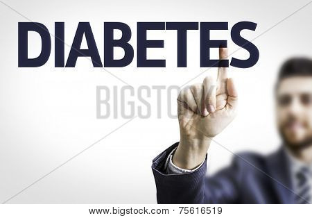 Business man pointing to transparent board with text: Diabetes