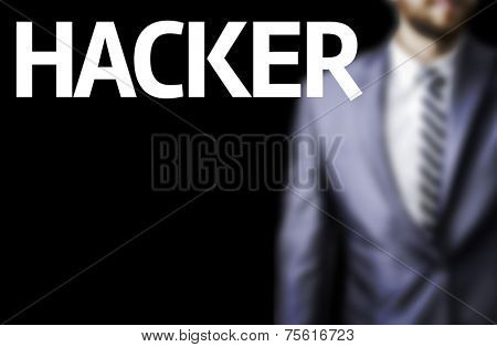 Hacker written on a board with a business man on background