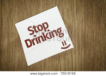 Stop Drinking on Paper Note on sky background