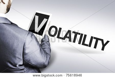 Business man with the text Volatility in a concept image