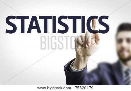 Business man pointing to transparent board with text: Statistics