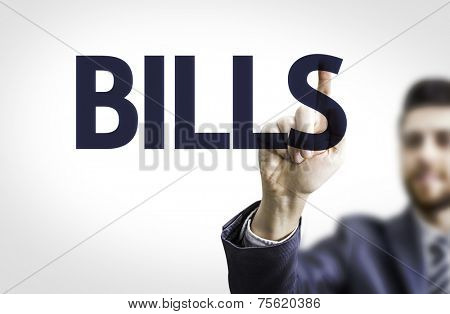 Business man pointing to transparent board with text: Bills