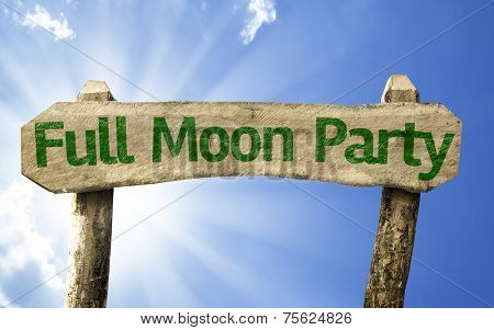Full Moon Party wooden sign on a beautiful day