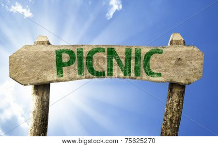 Picnic wooden sign on a summer day