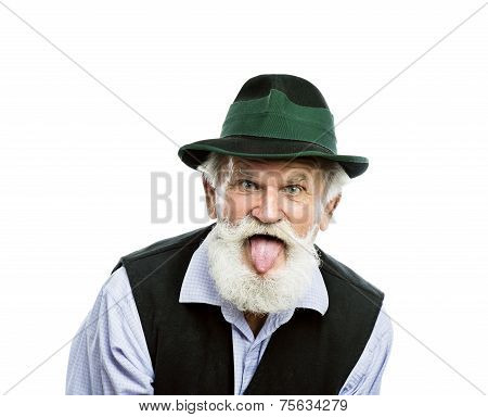 Old bavarian man in hat on white background