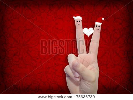 Concept or conceptual old vintage red pattern paper background with man and woman finger in love with Christmas hats and a heart painted, metaphor to family, couple, celebration, holiday, roamnce card