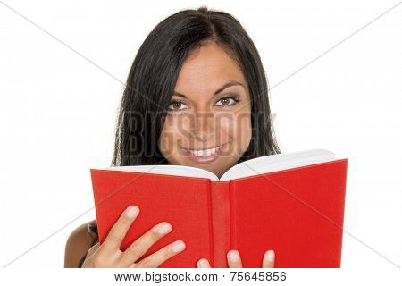 a young woman reading a book with a red envelope