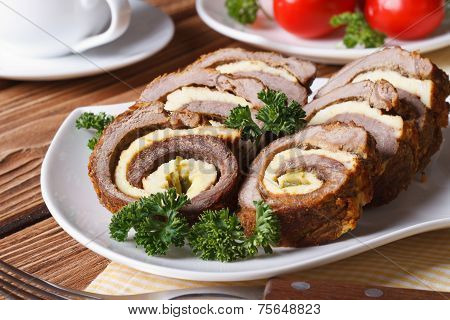 Delicious Chopped Beef Roll With Egg On A White Plate