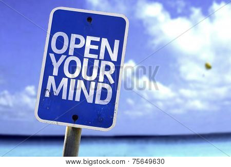 Open Your Mind sign with a beach on background