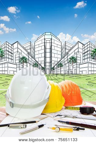 Architect Working Table With Writiing Tool  Safety Helmet And Perspective Plan Drawing Of New Buildi