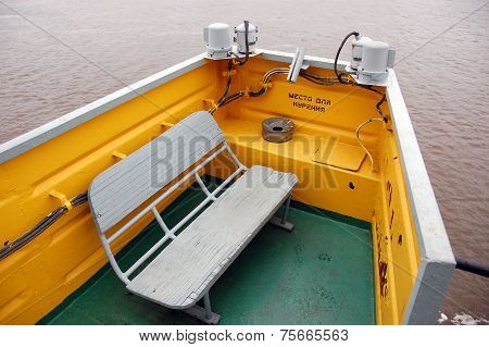 White Timber Bench At Smoking Area On River Ship