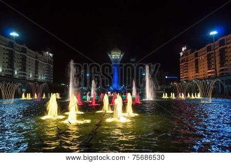 Bayterek Tower And  Fountain Show At Night