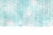 Abstract background in winter colors with blurry light dots. Snowfall and light effects give it a dr
