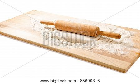 ough and flour with rolling pin on board isolated