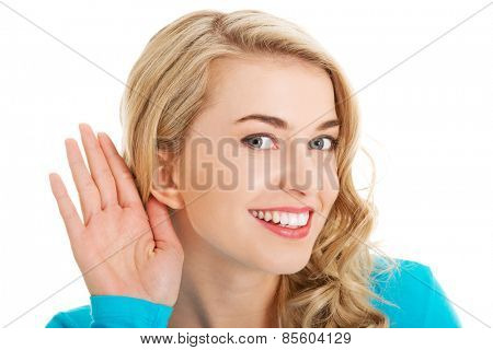 Portrait of woman overhearing a conversation.