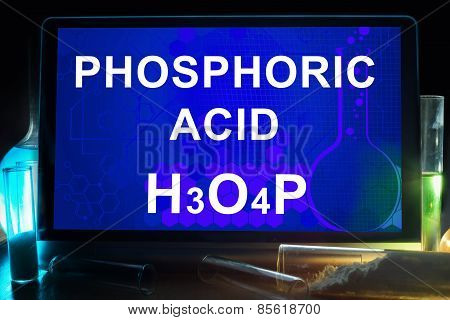 Tablet with chemical formula of phosphoric acid.