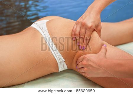 Legs and buttocks woman massage to reduce cellulite