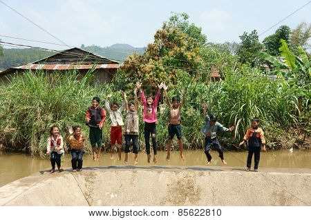 Asian Children Bath In The River