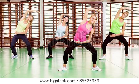 Women exercising in gym