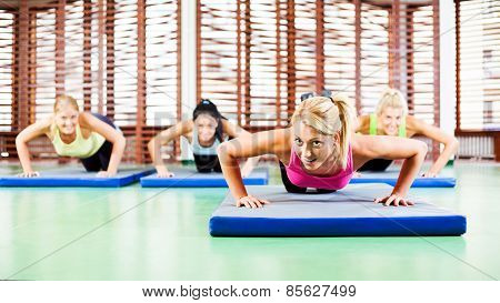 Exercising in gym