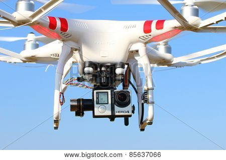 PILSEN CZECH REPUBLIC - MARCH 18, 2015: Drone quadrocopter Dji Phantom 2 with digital camera GoPro HERO4 Black edition. New tool for aerial photo and video.
