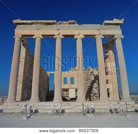 Backside Of The Erechtheion Temple With Ionic Columns In Acropolis, Athens, Greece