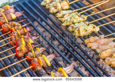 many bbq sticks on grill, outdoor, summer bbq time
