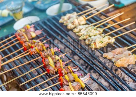 many bbq sticks on grill, outdoor, summer bbq time
